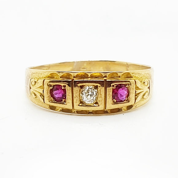 18ct Yellow gold Diamond and Ruby trilogy.