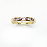 9ct Yellow gold diamond and ruby half eternity ring.